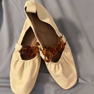 Aerosoles “Ramen” style dress flats with bold brown chain.